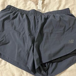 XL running shorts new balance. Compression shorts underneath sweat proof fabric